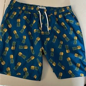 SWIM SHORTS. NEVER WORN. I HATE THE WATER!